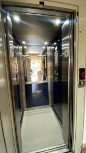 a hallway of a elevator in a train at Hotel Adriatik Ksamil in Ksamil