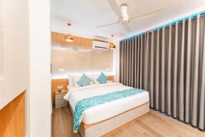 Hotel Star Shell客房内的一张或多张床位