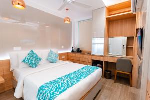 Hotel Star Shell客房内的一张或多张床位