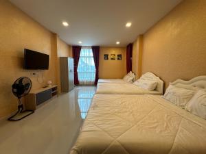 TV a/nebo společenská místnost v ubytování The Modiz Pool Villa Hua Hin 19