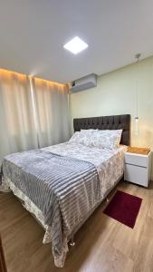 Postel nebo postele na pokoji v ubytování Apartamento na ponta negra 2 quartos