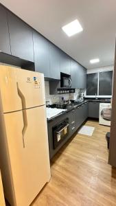 Kuchyň nebo kuchyňský kout v ubytování Apartamento na ponta negra 2 quartos + 15 fotografií