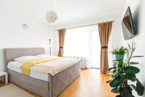 Ένα ή περισσότερα κρεβάτια σε δωμάτιο στο Cozy Escape