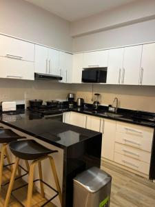 Nhà bếp/bếp nhỏ tại Departamento nuevo, lujoso y espacioso