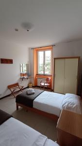 Postel nebo postele na pokoji v ubytování Hotel Montallegro