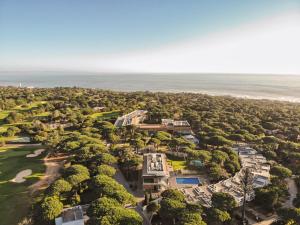an aerial view of the resort with the ocean in the background at Onyria Marinha Cascais, Vignette Collection by IHG in Cascais