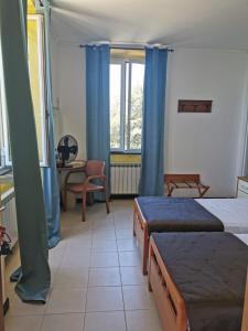 Postel nebo postele na pokoji v ubytování Hotel Montallegro