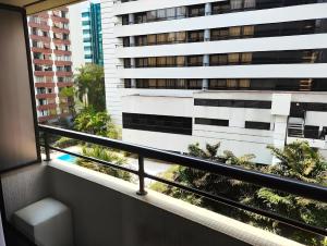 a balcony with a view of a building at BOOK A FLAT Gran plaza Paulista in Sao Paulo