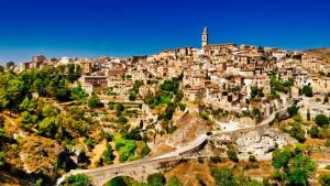 a village on top of a mountain with a road at Casa Ariadna in Bocairent