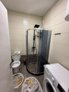 Koupelna v ubytování Elite Central Apartment + 1 fotografie