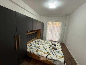 Postel nebo postele na pokoji v ubytování Elite Central Apartment