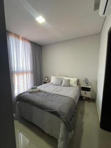 En eller flere senge i et værelse på Magnífico departamento en San Lorenzo