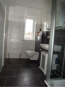 Koupelna v ubytování K 357 - Staffboarding - Personal- und Monteurzimmervermietung und Vermittlung in Glinde