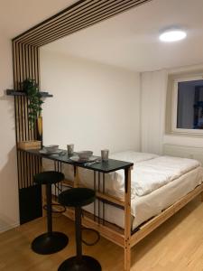 Posteľ alebo postele v izbe v ubytovaní Zentrale Wohnung an der Gondel & Naturblick
