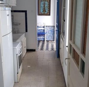 Η κουζίνα ή μικρή κουζίνα στο Villa du Azzouz Bizerte