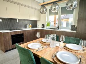 Η κουζίνα ή μικρή κουζίνα στο Dom przy Żurawiej +5 φωτογραφίες