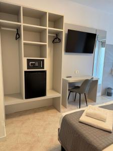 Kuchyň nebo kuchyňský kout v ubytování Hotel DOLCEVITA Park & Beach included