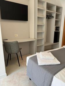 TV a/nebo společenská místnost v ubytování Hotel DOLCEVITA Park & Beach included