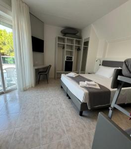 TV a/nebo společenská místnost v ubytování Hotel DOLCEVITA Park & Beach included
