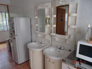 Ein Badezimmer in der Unterkunft Minshuku Getto