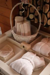 a drawer filled with towels and a basket of towels at Abies Alba in Yarema residence zone
