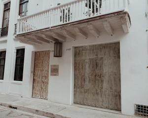 two doors on the side of a building at Hotel Casa La Mantilla by Faranda Boutique in Cartagena de Indias