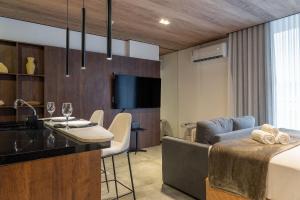 TV/trung tâm giải trí tại Edifício New Time Apt 1405-Mandi Hospitalidade