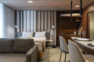 Khu vực ghế ngồi tại Edifício New Time Apt 1405-Mandi Hospitalidade