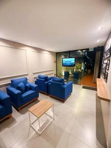 Khu vực ghế ngồi tại Ivaí Hotel