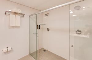 Um banheiro em Allia Gran Pampulha Suites