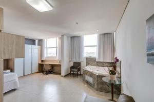 Foto da galeria de Allia Gran Pampulha Suites em Belo Horizonte