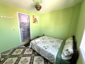 Postel nebo postele na pokoji v ubytování Beach House