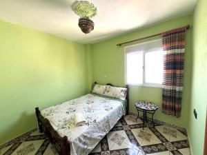 Postel nebo postele na pokoji v ubytování Beach House