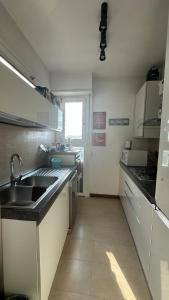 a kitchen with a sink and a counter top at Mariste in Rome