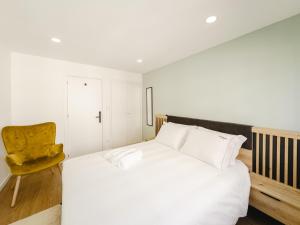 En eller flere senge i et værelse på Chocolate House