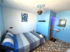 Postel nebo postele na pokoji v ubytování Beach House