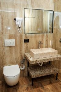 Koupelna v ubytování OLI Hotel