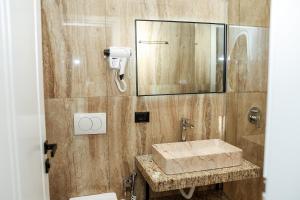 Koupelna v ubytování OLI Hotel