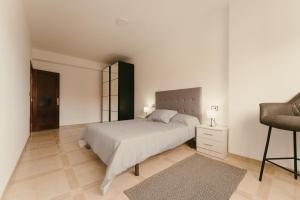 Кровать или кровати в номере Rias Baixas Vistas al mar Espacioso