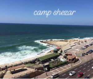an aerial view of the beach and the ocean at غرف فندقية للايجار in Alexandria