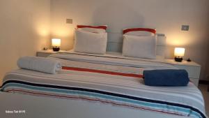 Una cama o camas en una habitación de Adeline house