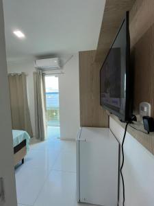Televisyen dan/atau pusat hiburan di Lucky Suites Jorro