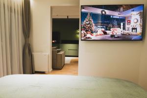 TV a/nebo společenská místnost v ubytování Erika's Apartments