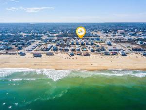 an aerial view of a beach with a yellow balloon at 4057 - Fairways Seaspray in Kitty Hawk Beach