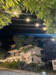 a building at night with lights on it at Jeryeong Forest Pension in Gapyeong