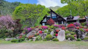Zahrada ubytování Woohyang Gallery Pension + 3 fotografie