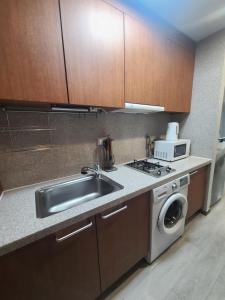 Kuchyň nebo kuchyňský kout v ubytování Hotel Modak Namdaemun