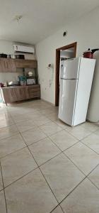 Kuchyň nebo kuchyňský kout v ubytování Casa Ubatuba