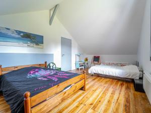 Postel nebo postele na pokoji v ubytování Maison familiale à Saint-Julien-en-Born, 8 pers, proche océan - FR-1-50-191