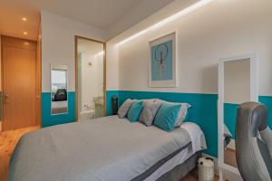 Postel nebo postele na pokoji v ubytování TOP VIEW PENTHOUSE Private Rooftop, Wi-Fi 500Mbps, Air Conditioning, Grill, Pool and Gym + 23 fotografií